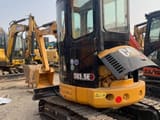 2025 Caterpillar 303.5E mini excavator rear three-quarter view