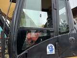 Caterpillar 329D crawler excavator cab side view