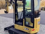 2022 Caterpillar 301.8 mini excavator, rear three-quarter view
