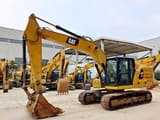 2018 Caterpillar 320GC crawler excavator, front three-quarter view