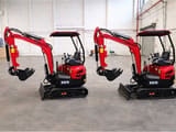 Two Freutek KN15 mini excavators, side view