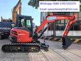 2023 Kubota KX057-4 mini excavator, side view