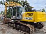 2005 New Holland E215 crawler excavator, rear three-quarter view