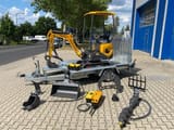 Berger Kraus BK1000JS mini excavator on trailer with attachments