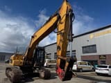 2010 Caterpillar 329D crawler excavator, side view