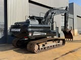 2021 Doosan DX225LC-5 crawler excavator, rear three-quarter view