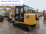 2023 Caterpillar 305.5E2 mini excavator rear three-quarter view
