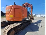 2019 Hitachi ZX225 crawler excavator, rear three-quarter view