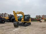 2024 Komatsu PC70-8 mini excavator, front three-quarter view