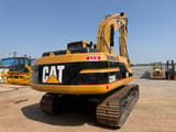 2017 Caterpillar 320BL crawler excavator, rear three-quarter view