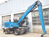Manipulador de materiais Fuchs MHL320D de 2016 em vista de perfil lateral