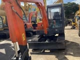 2019 Doosan DH55-V mini excavator, front three-quarter view
