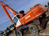 1994 Atlas 1804MI material handler, rear three-quarter view