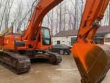 2023 Doosan DX300LC crawler excavator, side view