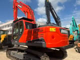 2023 Doosan DX225LCA crawler excavator, rear three-quarter view