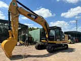 2025 Caterpillar 320D2 crawler excavator, side profile view