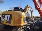 2019 Caterpillar 315DL crawler excavator, rear three-quarter view