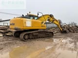 2006 Komatsu PC210LC-7 crawler excavator, rear three-quarter view