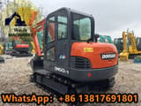 2023 Doosan DH60-7 mini excavator, rear three-quarter view