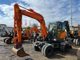 2014 Doosan DX55W wheel excavator, front three-quarter view