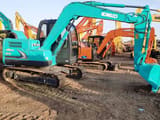 2024 Kobelco SK75-8 mini excavator, side view