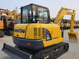 2024 Komatsu PC56 mini excavator, rear three-quarter view