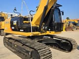 2023 Caterpillar 323DL excavator side view