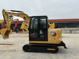 2022 Caterpillar 305.5E2 mini excavator, side profile view