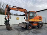 2012 Volvo EW140D wheel excavator side view