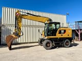2016 Caterpillar M318F wheel excavator, side view