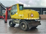 2004 Atlas 1305 M wheel excavator, rear three-quarter view