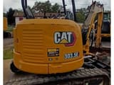2020 Caterpillar 303.5E CR crawler excavator, rear three-quarter view