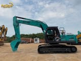 Kobelco SK200 crawler excavator, side view