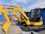 Komatsu PC50MR mini excavator, side view