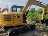 2020 Caterpillar 307E mini excavator, rear three-quarter view