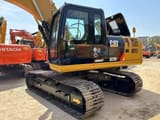 2015 Caterpillar 323DL crawler excavator, side view