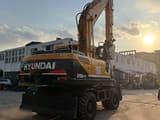 2021 Hyundai 210W-9 wheel excavator, rear three-quarter view