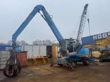 2011 Fuchs MHL335 material handler, side view