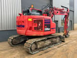 2017 Komatsu PC138US-11 crawler excavator, rear three-quarter view