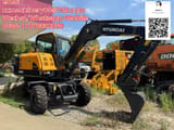Hyundai R60W wheel excavator, side profile view