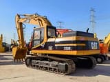 2016 Caterpillar 325BL crawler excavator, rear three-quarter view