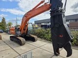 2011 Sennebogen ZX210 scrap shear, side view