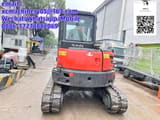 2023 Kubota KX057-4 mini excavator, rear view
