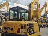 2025 Komatsu PC58 mini excavator rear three-quarter view