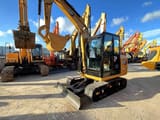 2022 Caterpillar 305.5 E2 mini excavator, front three-quarter view