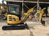 2023 Caterpillar 303GR mini excavator, side view