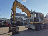 2010 Liebherr A316 LITRONIC material handler, front three-quarter view