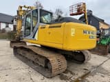 2011 New Holland Kobelco E215B crawler excavator rear three-quarter view