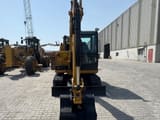 2023 Caterpillar 305.5E2 mini excavator, front view