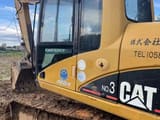 2023 Caterpillar 312C crawler excavator side view